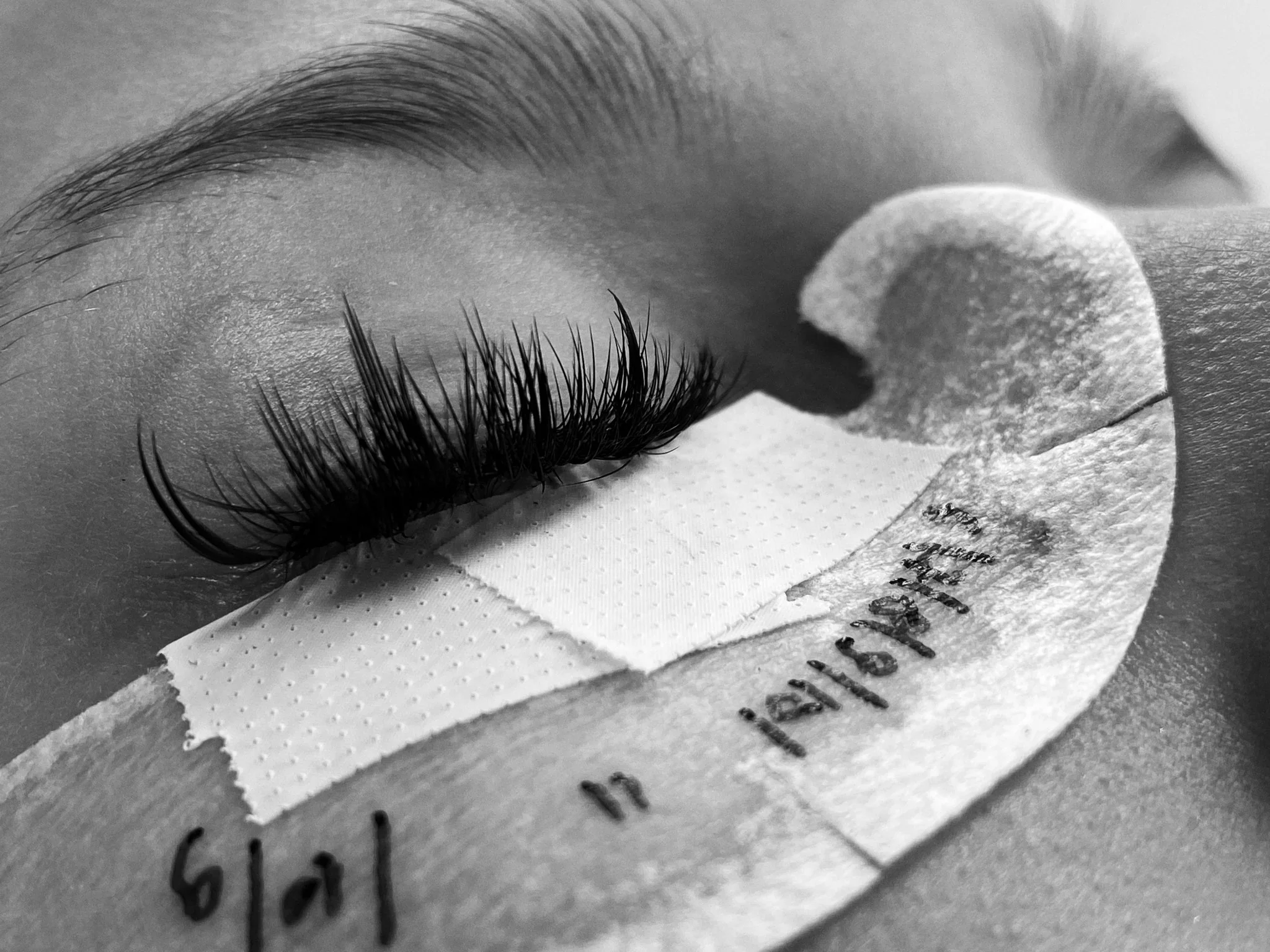Close-up of eyelash extensions during a lash service.